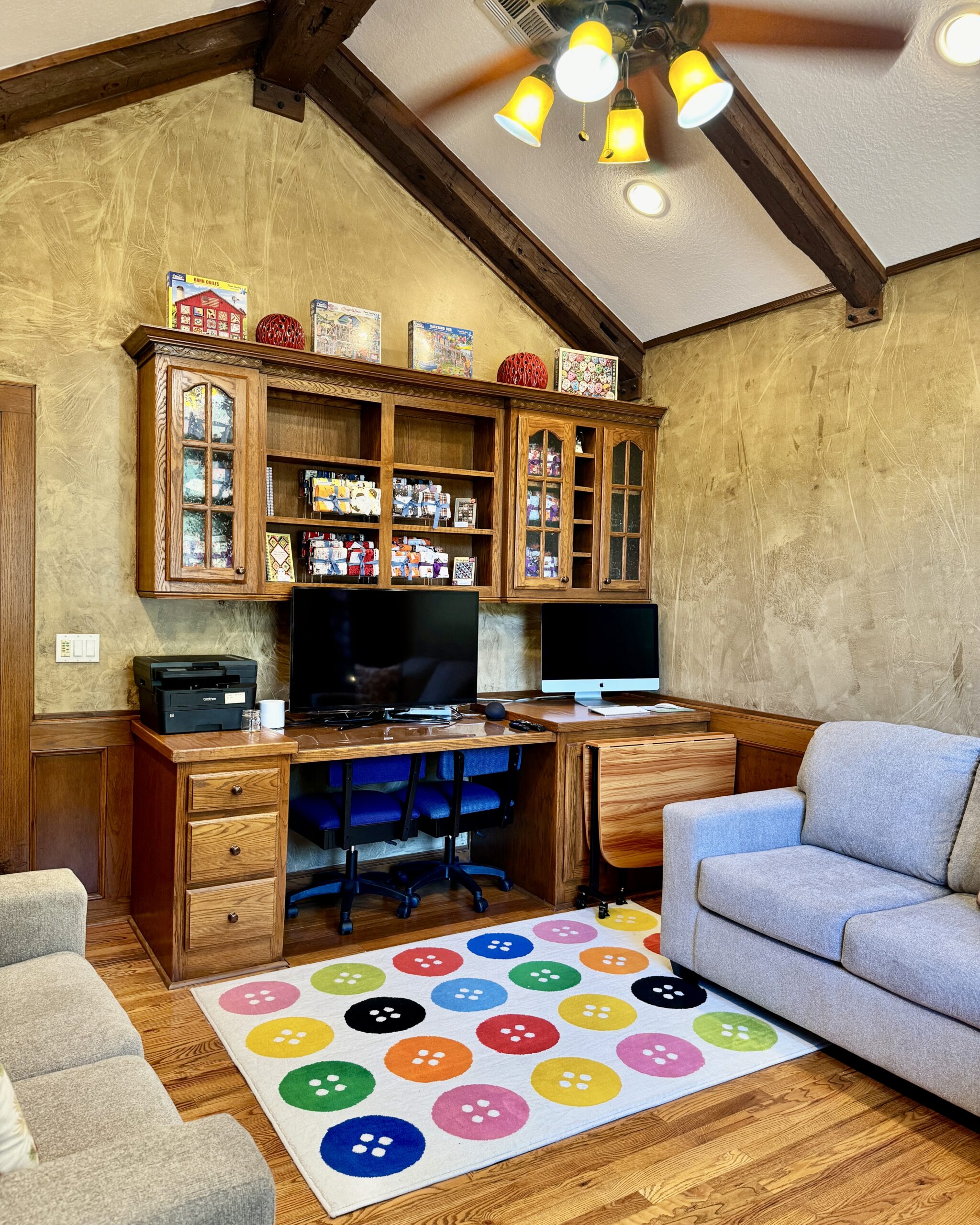 bank of cabinets with tv and printer